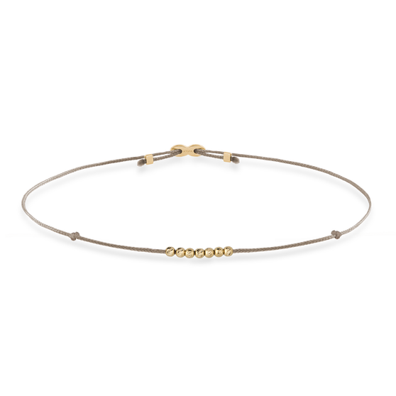 Armband LANA mit beigem Stoffband und 6 Perlen aus Gelbgold in Vorderansicht