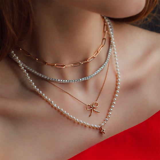 Halsketten Layering in Roségold mit weißen Diamanten, Perlen und Maschen-Anhänger