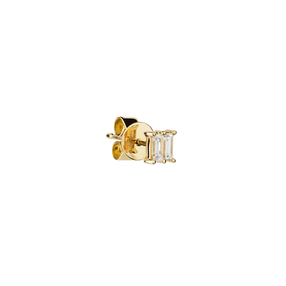 Eleganter Ohrstecker aus 18 KT Gelbgold gefertigt mit zwei weißen Diamanten in Baguette-Schliff horizontal platziert in Seitenansicht