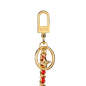 Detailansicht von Schlüsselkette Max in Gold mit rotem Stoffband